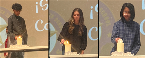 Three students lighting candles